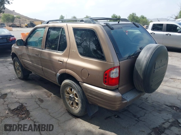 2000 Isuzu Rodeo with VIN 4S2DM58W3Y4328503, listed as a IAAI auction lot 42405198 with 190,328 mi miles and . Bid and sale history available at DreamBid. Image 3.
