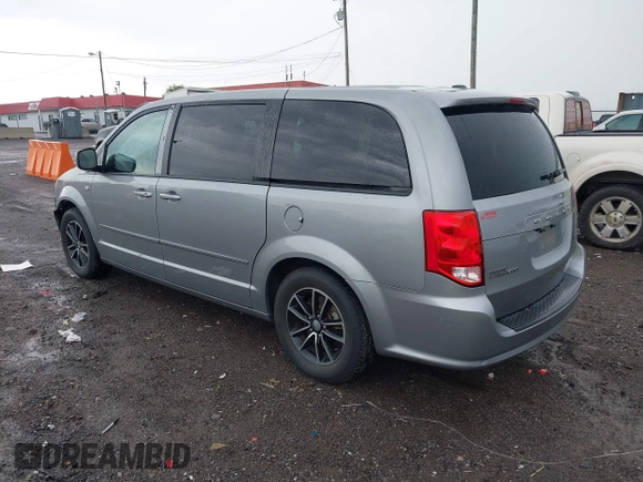 2014 Dodge Grand Caravan SXT with VIN 2C4RDGCG3ER451465, listed as a IAAI auction lot 42111958 with 176,707 mi miles and . Bid and sale history available at DreamBid. Image 3.