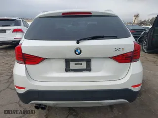 2013 BMW X1 28i with VIN WBAVM1C53DVW45884, listed as a IAAI auction lot 41750396 with 143,287 mi miles. Bid and sale history available at carsss.com. Image 17.