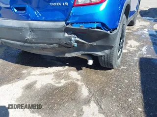 2015 Chevrolet Trax LS with VIN KL7CJKSB8FB116027, listed as a IAAI auction lot 41915553 with 105,541 mi miles. Bid and sale history available at carsss.com. Image 6.