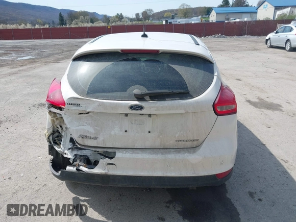2017 Ford Focus Titanium with VIN 1FADP3N24HL331009, listed as a IAAI auction lot 42029193 with 82,068 mi miles and . Bid and sale history available at carsss.com. Image 16.