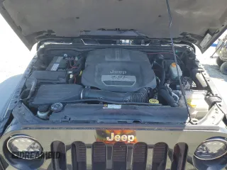 2012 Jeep Wrangler Unlimited Call of Duty MW3 with VIN 1C4BJWFGXCL148883, listed as a Copart auction lot 53162705 with 111,900 mi miles and Salvage title. Bid and sale history available at DreamBid. Image 14.