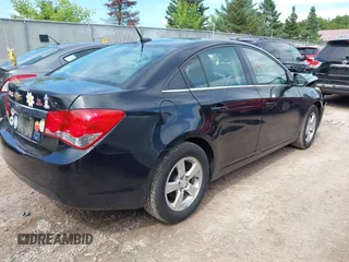 2014 Chevrolet Cruze 1LT with VIN 1G1PC5SB5E7433631, listed as a IAAI auction lot 42518491 with 99,962 mi miles and . Bid and sale history available at DreamBid. Image 4.