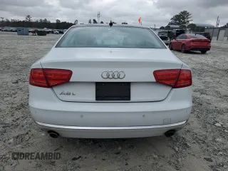 2014 Audi A8 3.0T z VIN WAURGAFD3EN003758, wystawiony jako Copart lot #47636885 z przebiegiem 166 990 mil mil oraz Szkody całkowita. Historia ofert i sprzedaży dostępna na DreamBid. Obrazek 6.