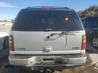 2005 GMC Yukon Denali z VIN 1GKEK63U35J228887, wystawiony jako Copart lot #68141304 z przebiegiem 238 024 mil mil oraz Szkoda całkowita • Salvage title. Historia ofert i sprzedaży dostępna na DreamBid. Obrazek 6.