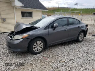 2012 Honda Civic LX z VIN 2HGFB2F58CH318923, wystawiony jako Copart lot #55430975 z przebiegiem 229 628 mil mil oraz Szkoda całkowita • Salvage title. Historia ofert i sprzedaży dostępna na DreamBid. Obrazek 1.