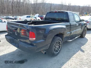 2006 Mitsubishi Raider LS with VIN 1Z7HC22K56S561574, listed as a IAAI auction lot 41757412 with 216,559 mi miles. Bid and sale history available at carsss.com. Image 4.