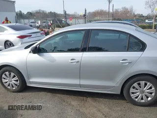 2014 Volkswagen Jetta S with VIN 3VW2K7AJ7EM313535, listed as a IAAI auction lot 41786112 with 63,694 mi miles and . Bid and sale history available at DreamBid. Image 14.