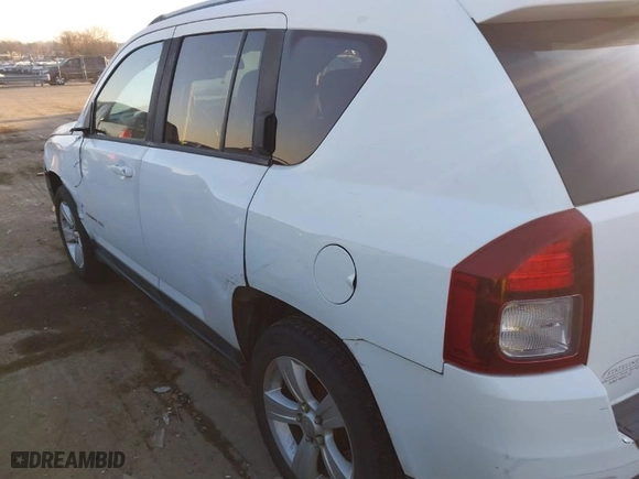 2014 Jeep Compass Latitude with VIN 1C4NJCEB4ED559713, listed as a IAAI auction lot 41653649 with 131,101 mi miles. Bid and sale history available at carsss.com. Image 15.