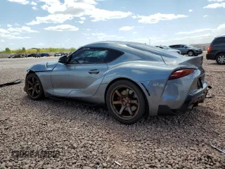 2021 Toyota Supra 3.0 z VIN WZ1DB0C02MW035473, wystawiony jako Copart lot #52582315 z przebiegiem Nie podano mil oraz Szkoda całkowita • Salvage title. Historia ofert i sprzedaży dostępna na DreamBid. Obrazek 2.