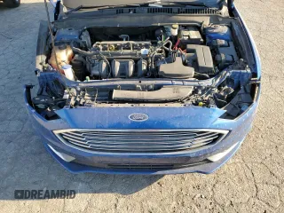 2018 Ford Fusion SE z VIN 3FA6P0H71JR107704, wystawiony jako Copart lot #75017244 z przebiegiem 202 999 mil mil oraz Nie do naprawy • Non repairable. Historia ofert i sprzedaży dostępna na DreamBid. Obrazek 11.