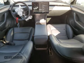 2021 Tesla Model 3 Standard Range Plus with VIN 5YJ3E1EA0MF017765, listed as a Copart auction lot 42776525 with 54,873 mi miles and Salvage Title. Bid and sale history available at carsss.com. Image 8.