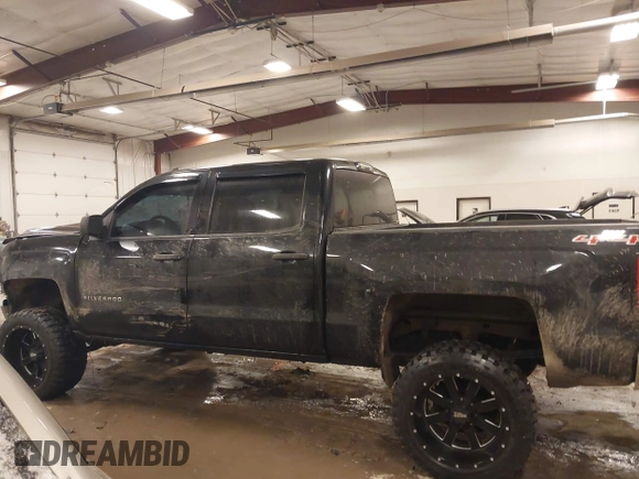 2014 Chevrolet Silverado 1500 LT with VIN 3GCUKRECXEG503427, listed as a IAAI auction lot 41526582 with 130,070 mi miles and . Bid and sale history available at DreamBid. Image 14.
