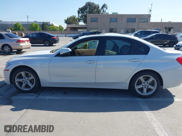 2014 BMW 3 Series 320i with VIN WBA3B1G50ENN90657, listed as a IAAI auction lot 42304612 with 129,377 mi miles and . Bid and sale history available at DreamBid. Image 15.