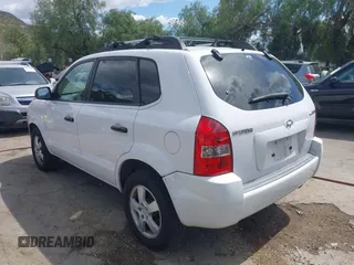 2006 Hyundai Tucson GL with VIN KM8JM12B66U254774, listed as a IAAI auction lot 41940080 with 152,382 mi miles. Bid and sale history available at carsss.com. Image 3.