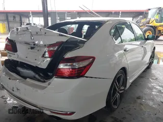 2017 Honda Accord Sport with VIN 1HGCR2F54HA136317, listed as a IAAI auction lot 42091828 with 146,628 mi miles and . Bid and sale history available at carsss.com. Image 4.
