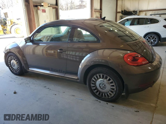 2014 Volkswagen Beetle 2.5L w/Sun with VIN 3VWJP7AT0EM632824, listed as a Copart auction lot 87279494 with Not Provided miles and Salvage Title. Bid and sale history available at DreamBid. Image 2.