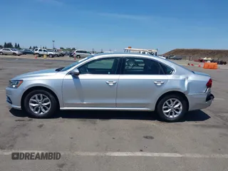 2017 Volkswagen Passat S with VIN 1VWAT7A32HC009657, listed as a IAAI auction lot 42541472 with 100,026 mi miles and . Bid and sale history available at DreamBid. Image 14.