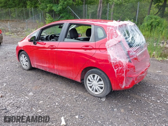 2016 Honda Fit LX with VIN JHMGK5H55GX012649, listed as a IAAI auction lot 42657017 with 82,043 mi miles and . Bid and sale history available at DreamBid. Image 3.