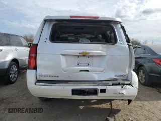 2019 Chevrolet Suburban Premier with VIN 1GNSKJKC4KR249147, listed as a Copart auction lot 79058174 with 88,514 mi miles and Salvage Title. Bid and sale history available at DreamBid. Image 6.
