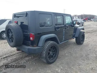 2008 Jeep Wrangler Rubicon with VIN 1J8GA69128L547347, listed as a IAAI auction lot 41985787 with 151,461 mi miles and . Bid and sale history available at DreamBid. Image 4.