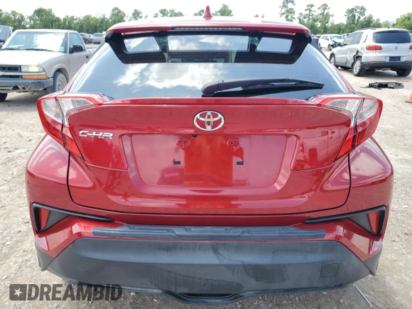 2021 Toyota C-HR LE with VIN JTNKHMBX0M1098199, listed as a Copart auction lot 56197565 with 33,119 mi miles and Salvage Title. Bid and sale history available at DreamBid. Image 6.