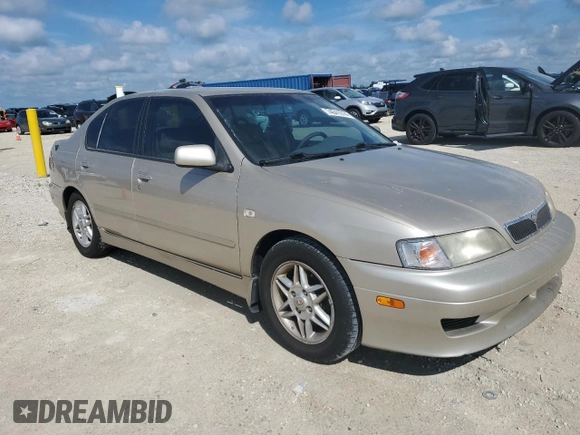 2002 Infiniti G20 Luxury z VIN JNKCP11A12T501940, wystawiony jako Copart lot #74041014 z przebiegiem Nie podano mil oraz Szkoda całkowita • Salvage title. Historia ofert i sprzedaży dostępna na DreamBid. Obrazek 4.