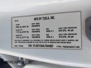 2020 Tesla Model 3 Standard Range Plus with VIN 5YJ3E1EA4LF644967, listed as a IAAI auction lot 41745984 with 23,479 mi miles and . Bid and sale history available at DreamBid. Image 9.