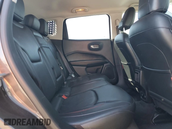 2018 Jeep Compass Trailhawk z VIN 3C4NJDDB0JT130449, wystawiony jako Copart lot #57486015 z przebiegiem 87 318 mil mil oraz Szkoda całkowita • Salvage title. Historia ofert i sprzedaży dostępna na DreamBid. Obrazek 11.