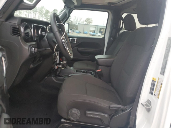 2023 Jeep Wrangler Sport S with VIN 1C4HJXDN6PW634600, listed as a Copart auction lot 85151924 with 26,111 mi miles and Clean Title. Bid and sale history available at DreamBid. Image 7.