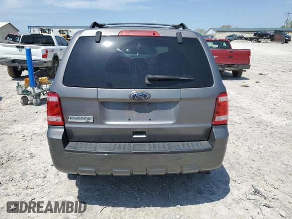 2011 Ford Escape XLT with VIN 1FMCU0D74BKA19310, listed as a Copart auction lot 52360255 with 232,575 mi miles and Salvage Title. Bid and sale history available at carsss.com. Image 6.