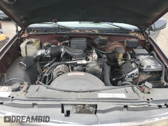 1999 Chevrolet Tahoe Z71 z VIN 1GNEK13R6XJ443409, wystawiony jako Copart lot #53613625 z przebiegiem 188 790 mil mil oraz Szkoda całkowita • Salvage title. Historia ofert i sprzedaży dostępna na DreamBid. Obrazek 12.