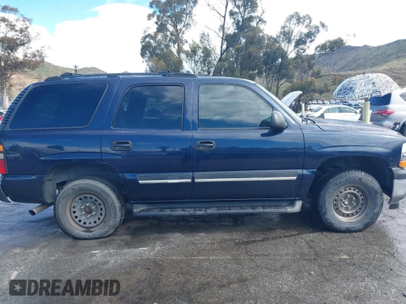 2005 Chevrolet Tahoe LT with VIN 1GNEC13T15R213638, listed as a IAAI auction lot 41787524 with 153,709 mi miles and . Bid and sale history available at DreamBid. Image 13.