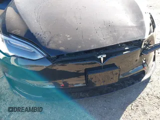 2021 Tesla Model S Long Range z VIN 5YJSA1E50MF438864, wystawiony jako IAAI lot #41190778 z przebiegiem Nie podano mil oraz . Historia ofert i sprzedaży dostępna na DreamBid. Obrazek 21.