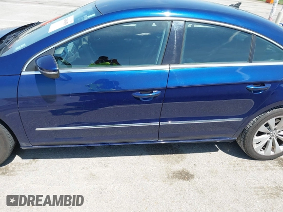 2009 Volkswagen CC Sport with VIN WVWML73C19E554798, listed as a IAAI auction lot 42084459 with 146,809 mi miles. Bid and sale history available at carsss.com. Image 12.