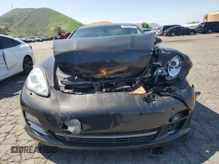 2013 Porsche Panamera с VIN WP0AA2A72DL014902, выставлен на аукционе Copart как лот 49202365 с пробегом 78 758 миль миль и Списание • Salvage title. История ставок и продаж доступна на DreamBid. Изображение 5.