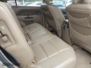 2006 Honda Pilot EX-L with VIN 5FNYF28566B010295, listed as a IAAI auction lot 41654433 with 302,539 mi miles. Bid and sale history available at carsss.com. Image 8.