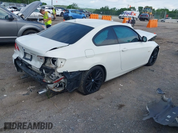 2011 BMW 3 Series 335i with VIN WBAKG7C56BE598702, listed as a IAAI auction lot 42159394 with Not provided miles and . Bid and sale history available at DreamBid. Image 4.