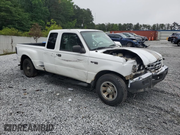 2002 Ford Ranger XL Fleet with VIN 1FTYR44U82TA21001, listed as a Copart auction lot 58392305 with 234,824 mi miles and Salvage title. Bid and sale history available at DreamBid. Image 4.