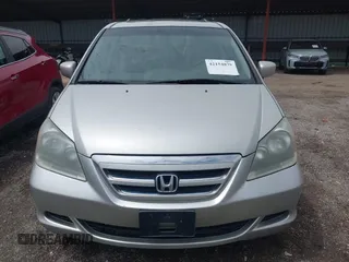 2007 Honda Odyssey EX-L with VIN 5FNRL38767B455948, listed as a IAAI auction lot 42154879 with 232,645 mi miles and . Bid and sale history available at DreamBid. Image 6.