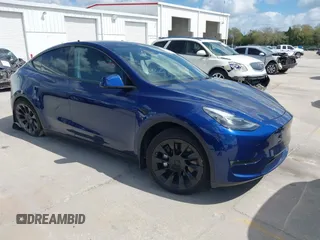 2023 Tesla Model Y Long Range with VIN 7SAYGDEE9PA205757, listed as a IAAI auction lot 41705881 with 18,567 mi miles and . Bid and sale history available at carsss.com. Image 1.