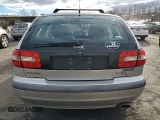 2001 Volvo V40 z VIN YV1VW29581F738166, wystawiony jako Copart lot #86166264 z przebiegiem 83 518 mil mil oraz Tytuł czysty. Historia ofert i sprzedaży dostępna na DreamBid. Obrazek 6.
