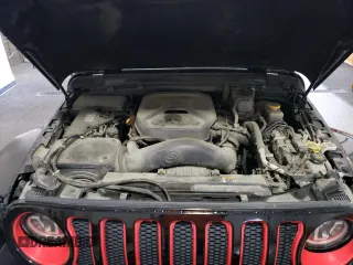 2020 Jeep Wrangler Unlimited Sahara z VIN 1C4HJXEN8LW118599, wystawiony jako Copart lot #60687535 z przebiegiem 74 824 mil mil oraz Czysty tytuł • Clean title. Historia ofert i sprzedaży dostępna na DreamBid. Obrazek 12.