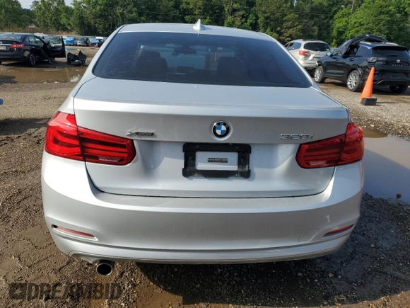 2018 BMW 3 Series 320i xDrive with VIN WBA8E5G52JNV02982, listed as a Copart auction lot 60742155 with 54,469 mi miles and Salvage title. Bid and sale history available at DreamBid. Image 6.