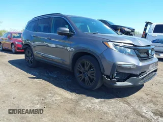 2021 Honda Pilot Special Edition z VIN 5FNYF6H27MB043638, wystawiony jako IAAI lot #42127878 z przebiegiem 50 401 mil mil oraz . Historia ofert i sprzedaży dostępna na DreamBid. Obrazek 1.