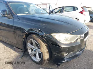 2015 BMW 3 Series 328i with VIN WBA3C1C55FK119562, listed as a IAAI auction lot 41945606 with 51,922 mi miles and . Bid and sale history available at DreamBid. Image 6.