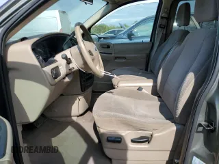 2003 Ford Windstar LX with VIN 2FMZA51413BB77562, listed as a Copart auction lot 56861095 with 170,562 mi miles and Salvage title. Bid and sale history available at DreamBid. Image 7.