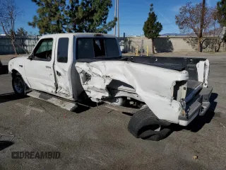 1999 Ford Ranger XLT with VIN 1FTYR14X6XPA45855, listed as a Copart auction lot 41889965 with 221,848 mi miles and Salvage Title. Bid and sale history available at DreamBid. Image 2.