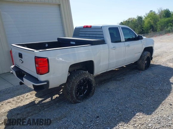2016 Chevrolet Silverado 1500 LT with VIN 1GCVKREC4GZ106299, listed as a IAAI auction lot 41984118 with 181,626 mi miles and . Bid and sale history available at DreamBid. Image 4.