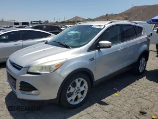2015 Ford Escape Titanium with VIN 1FMCU0JX3FUB81735, listed as a Copart auction lot 61622995 with 154,932 mi miles and Clean title. Bid and sale history available at DreamBid. Image 1.
